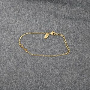 costume jewelry  MBD gold tone arrow bracelet